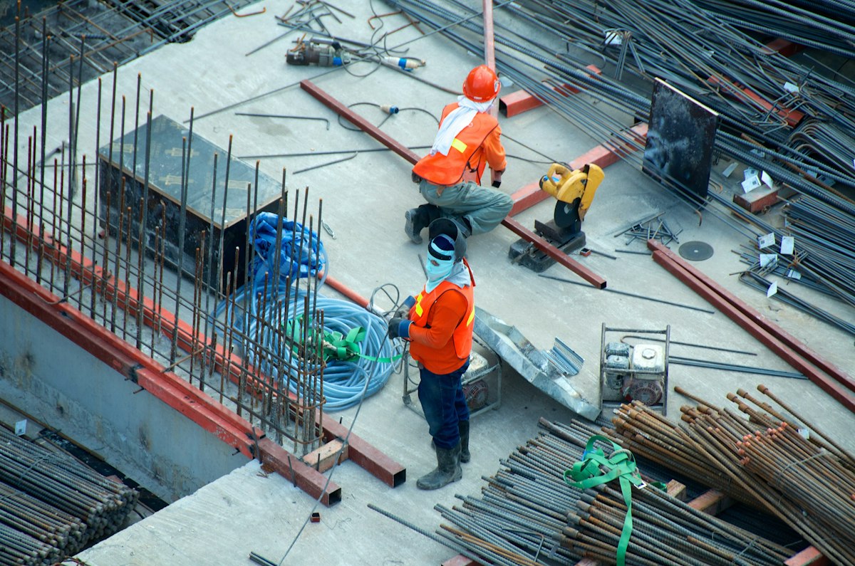 Commercial building inspector examining property systems